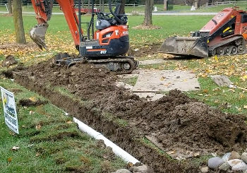 How To Install A Sump Pump Discharge Line To Prevent Failure French Drain Systems Curtain Drains Macomb Oakland Lapeer St Clair County