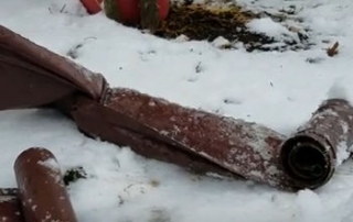 Don't use retractable gutter downspouts in Michigan