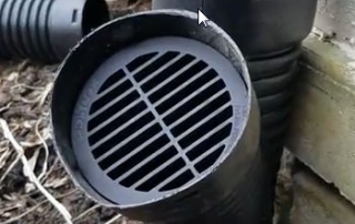 When and How to Use a Vented Downspout System