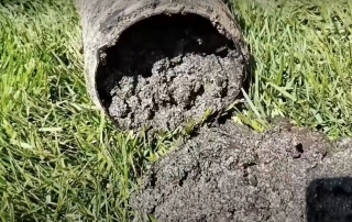 Shingle Gravel Trapped in Pipe with Belly
