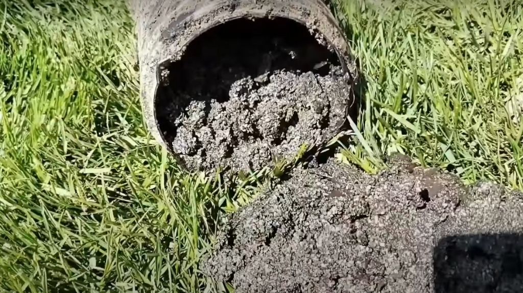 Shingle Gravel Trapped in Pipe with Belly