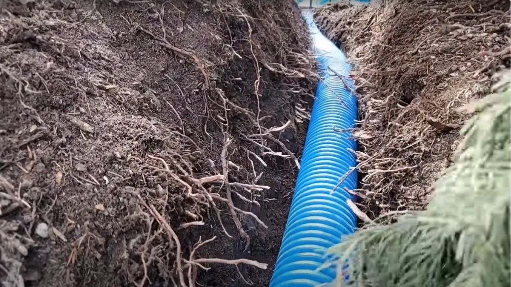 DIY Underground Downspouts Tip: Take Water Far Away from House