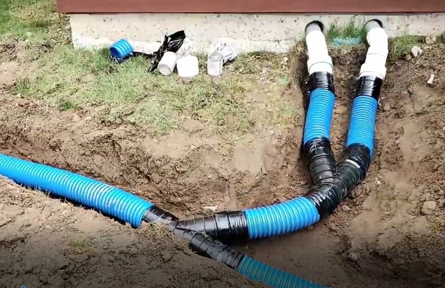How to Bury Downspouts: 5 Tips from the Pros