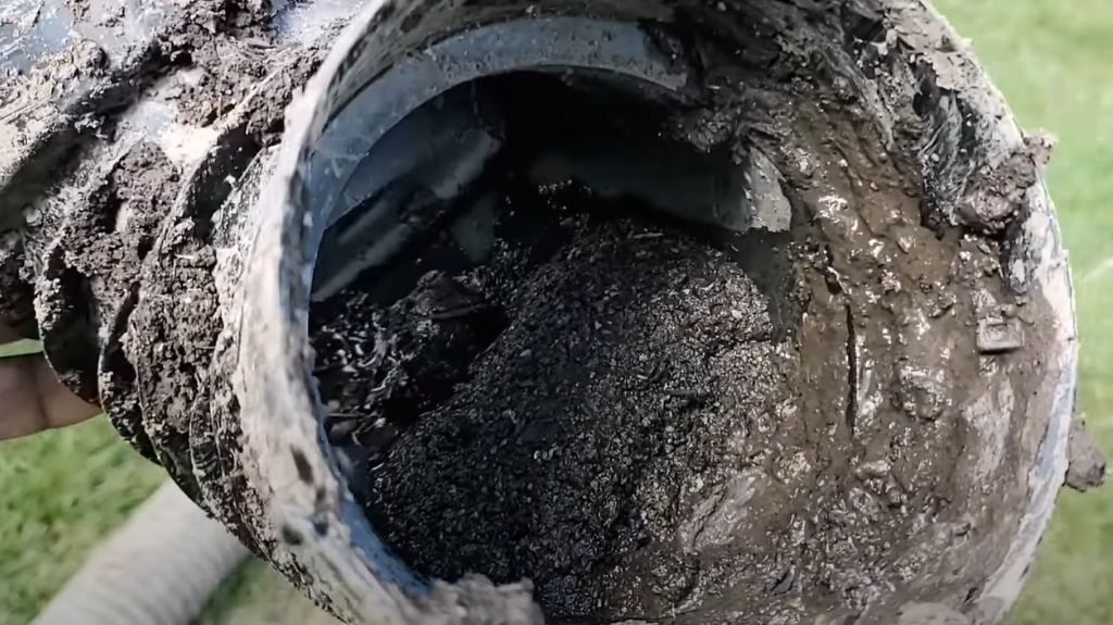 DIY Underground Downspouts Tip: Use Catch Basins
